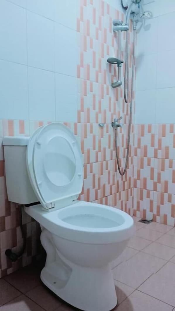 Shower, slippers, towels, soap