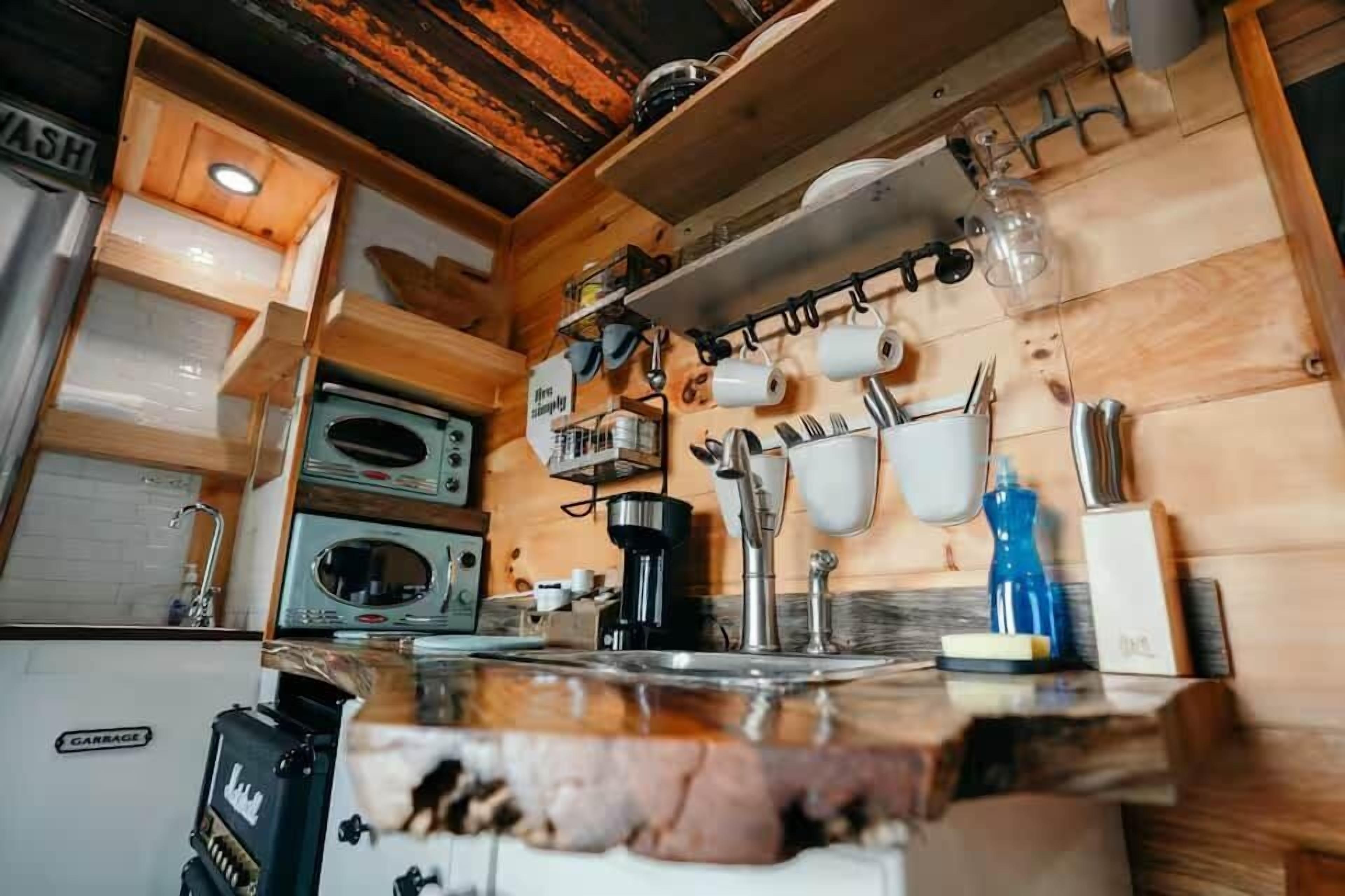 Fridge, microwave, cookware/dishes/utensils