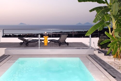 Villa Strega is surrounded by olive groves and Sicilian donkeys that roam freely across the land. Once an ancient stone farmhouse and old olive mill, it has now been transformed into an exclusive residence that preserves its historic charm while offering