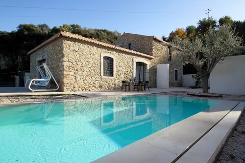 Villa Strega is surrounded by olive groves and Sicilian donkeys that roam freely across the land. Once an ancient stone farmhouse and old olive mill, it has now been transformed into an exclusive residence that preserves its historic charm while offering