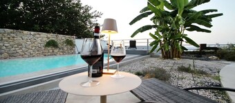 Villa Strega is surrounded by olive groves and Sicilian donkeys that roam freely across the land. Once an ancient stone farmhouse and old olive mill, it has now been transformed into an exclusive residence that preserves its historic charm while offering