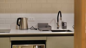 Superior Studio, Balcony, Mountain View | Private kitchen | Full-sized fridge, microwave, stovetop, cookware/dishes/utensils