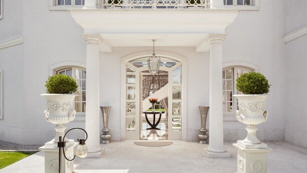 A grand entrance with a central staircase, flanked by two large urns with greenery, leading to a conservatory with a glass ceiling. - Villa Palazzo di Ivana with Pool (Vabriga)