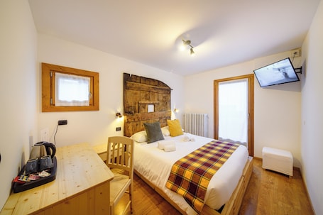 Wifi gratis y ropa de cama . Hotel Ambassador Bormio