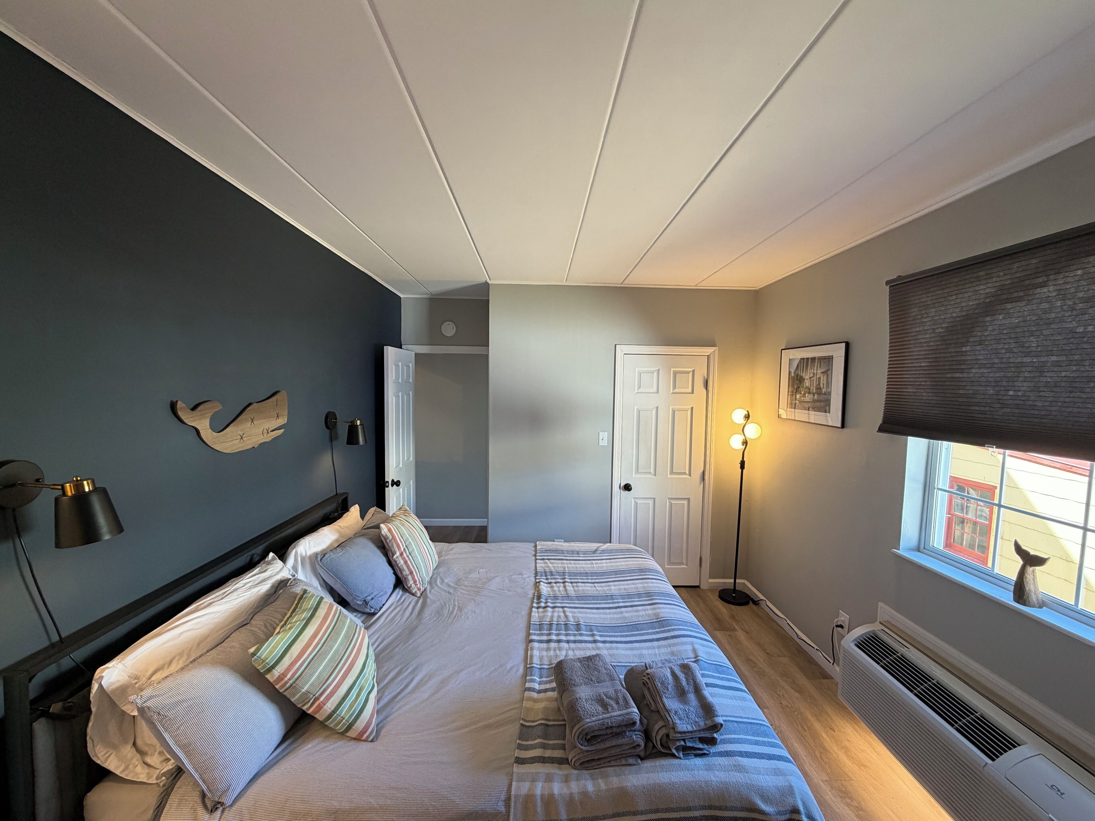 1 bedroom, desk, iron/ironing board, travel crib