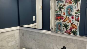 Eco-friendly toiletries, hair dryer, towels, soap
