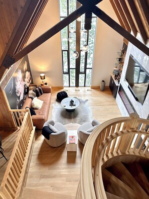 Smart TV, fireplace, books, printers