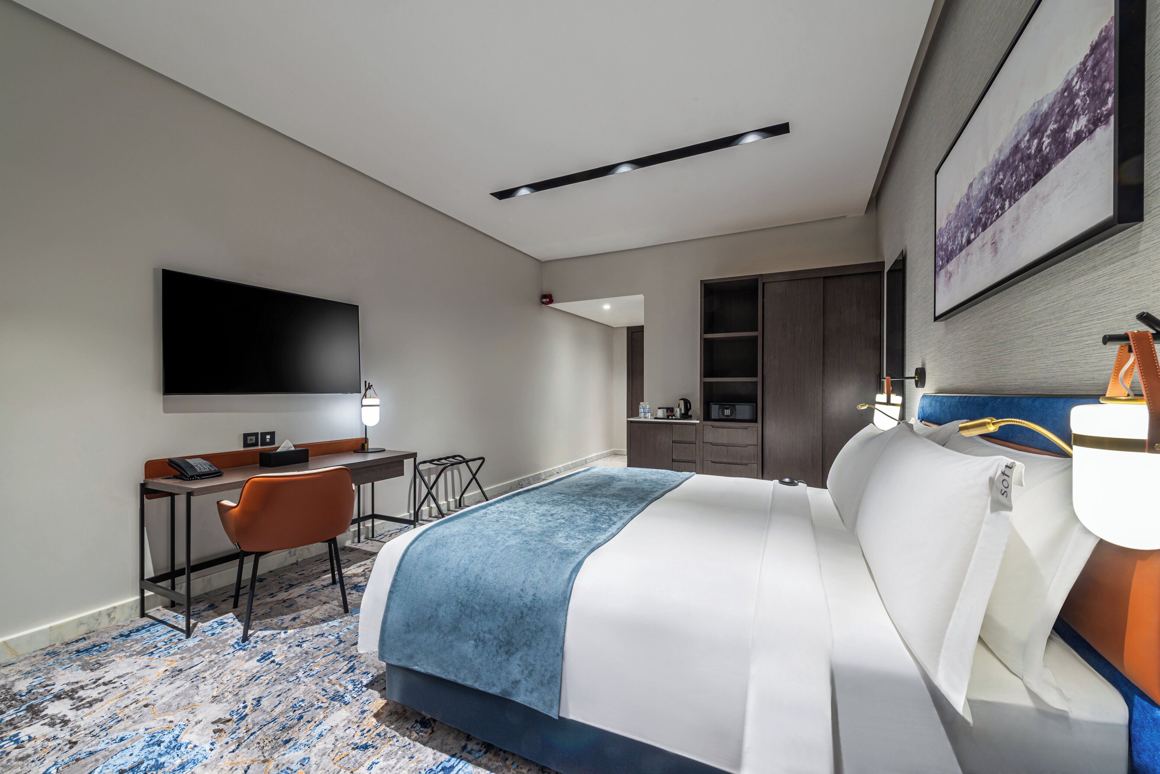 Premium bedding, down comforters, memory foam beds, in-room safe