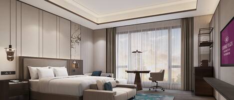 A modern bedroom with a large bed, a desk, and a chair.