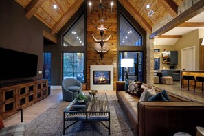 TV, fireplace, offices - Luxury Designer Home on a Creek + Hot Tub | NEW! (Broken Bow)