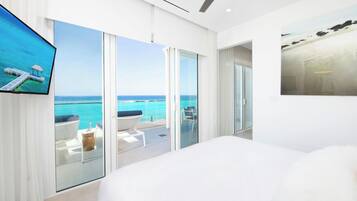 Luxury Condo, 2 Bedrooms, Balcony, Beachfront (Rum Point Resort #407) | 4 bedrooms, premium bedding, individually decorated