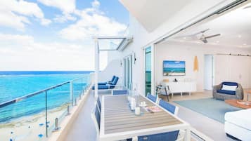 Luxury Condo, 3 Bedrooms, Balcony, Beachfront (Rum Point Resort #406) | Terrace/patio