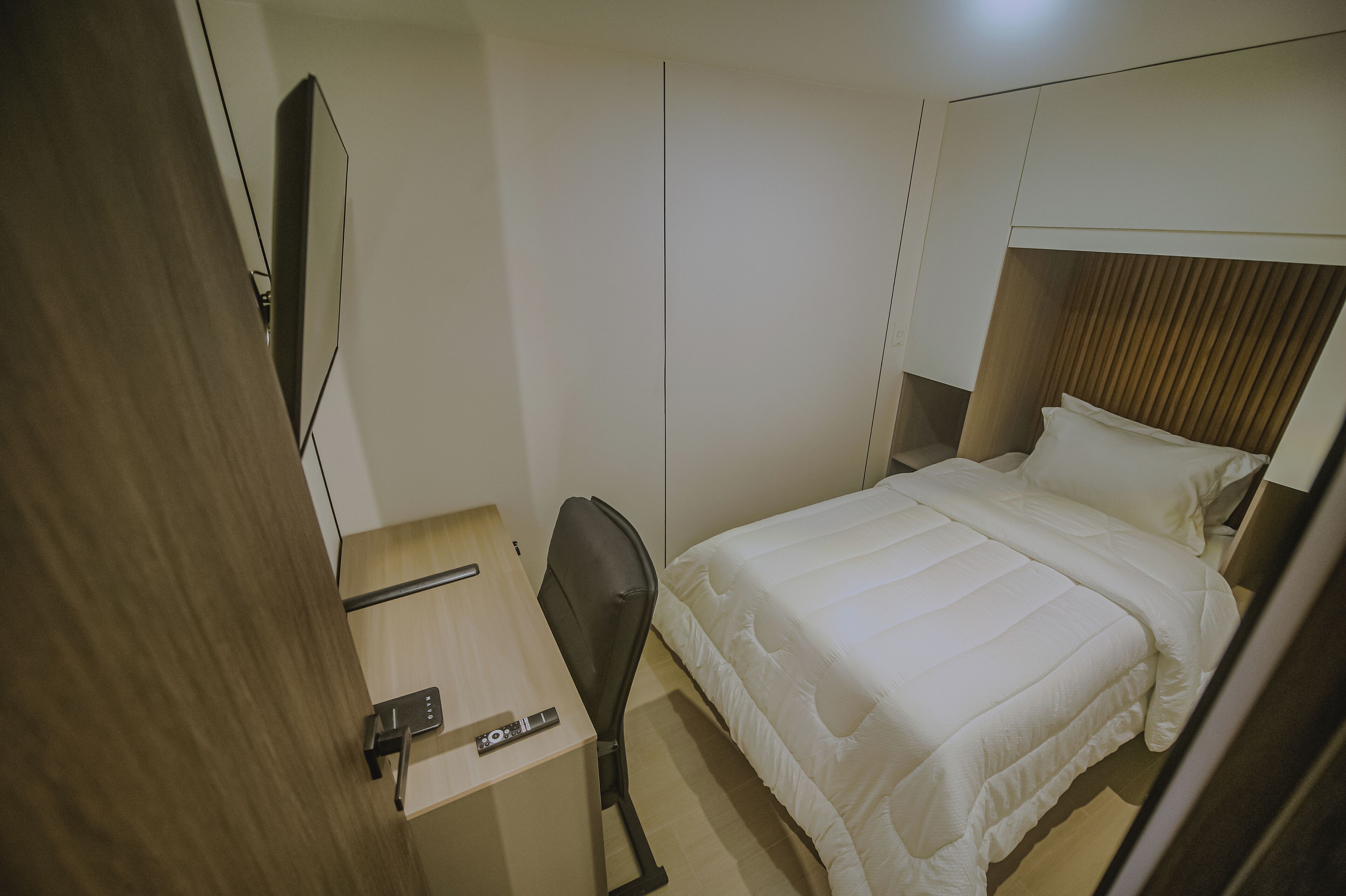 Premium bedding, desk, laptop workspace, free WiFi