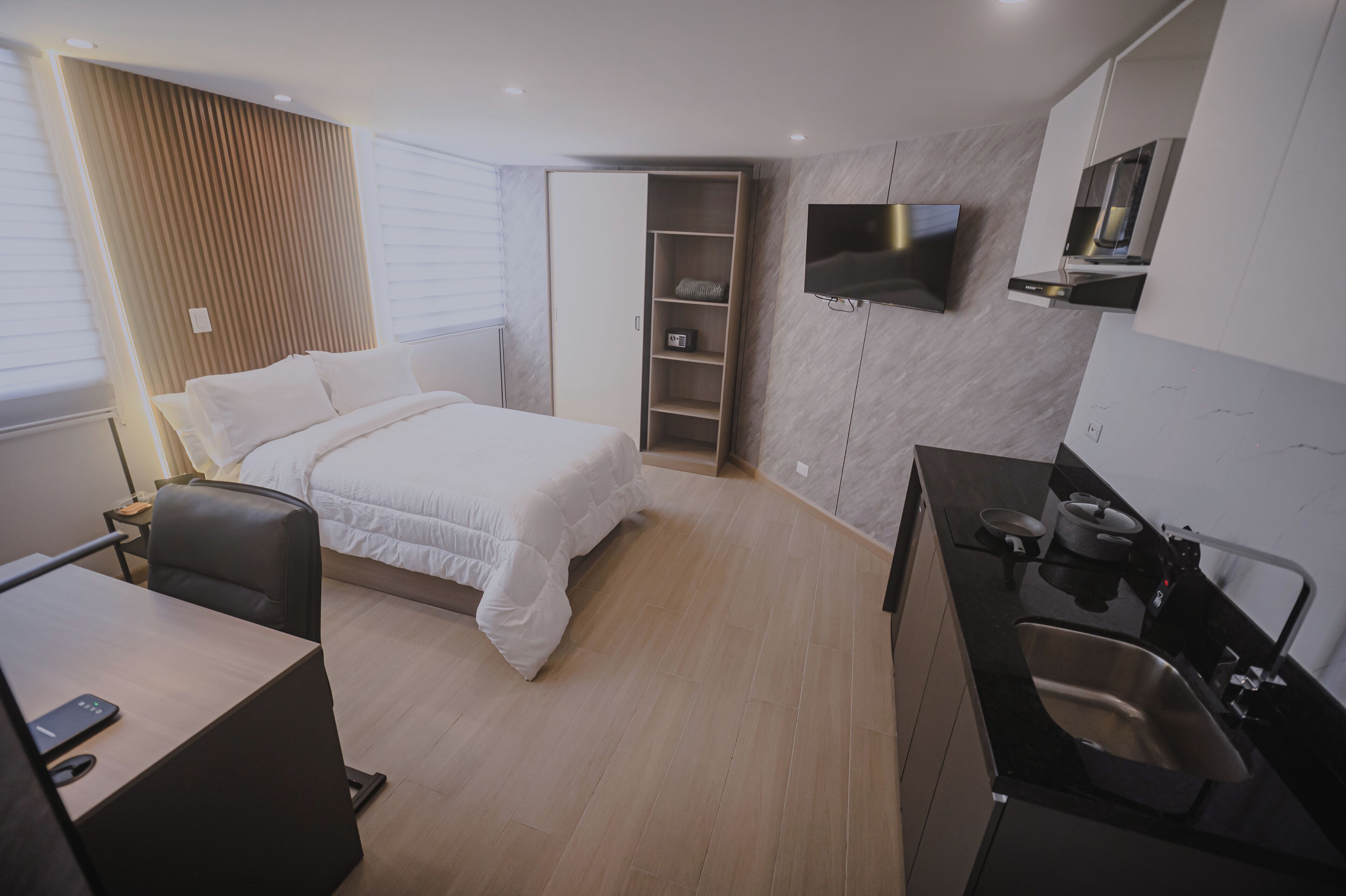 Premium bedding, desk, laptop workspace, free WiFi