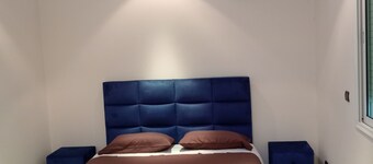 Charming 4-bedroom townhome with AC and garden space near a beautiful beach