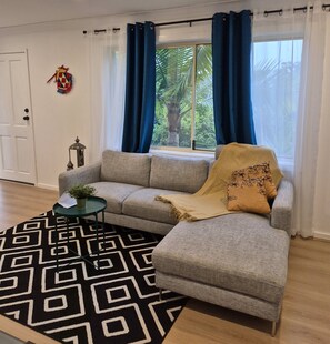 Living area - Entire Ground floor Apartment | Private Entry, AC & WiFi Suite (Macquarie Hills)