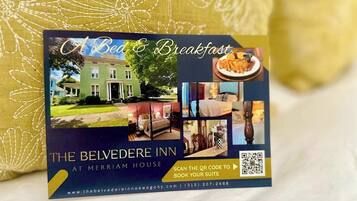 A brochure for The Belvedere Inn at Merriam House, featuring a photo of the building, a bedroom, and breakfast food.