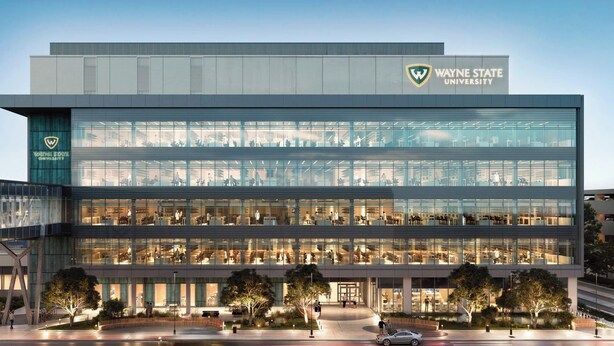 Wayne State University's modern building with multiple floors, large glass windows, and a central entrance. - Stunning City Views · Midtown Heart of Detroit · Clean · Free Parking (Detroit)