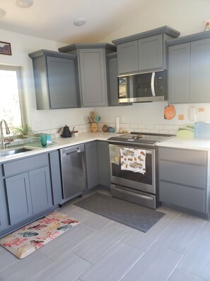 Fridge, microwave, oven, stovetop - The Hummingbird Haus
One-bedroom casita, minutes from Campbell Ave food district (Tucson)