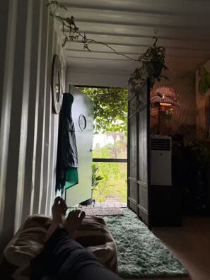 Interior - Luxury off-grid passionfruit covered shipping container immersed in nature. (Naples)