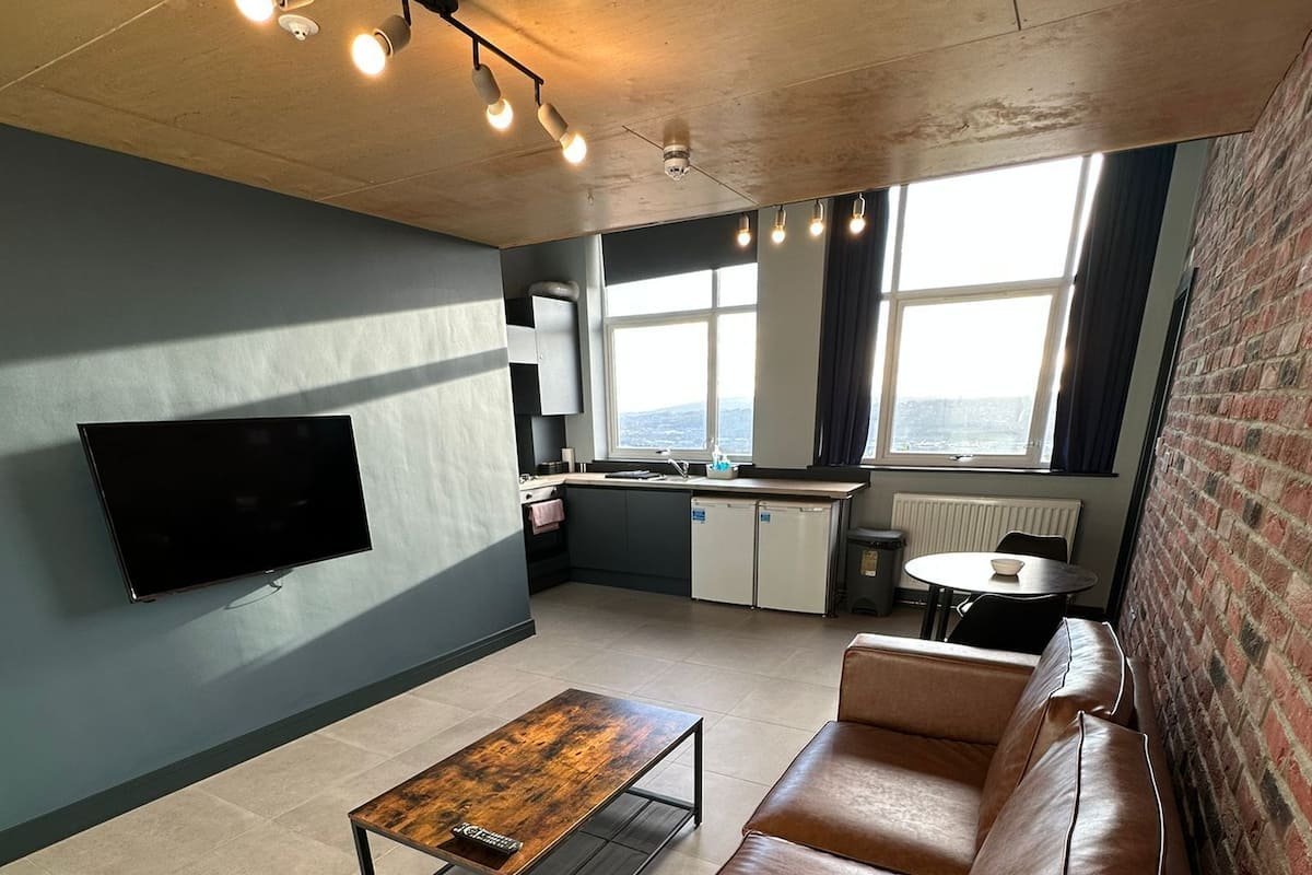 Apartamento conforto | Escrivaninha, espaço de trabalho para notebook, cortinas blackout