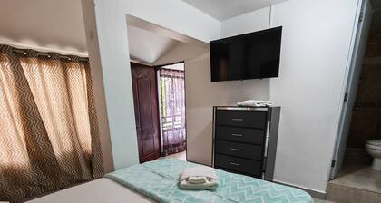 Cozy 3 rooms cabin in tranquil Santiago de los Caballeros with AC and wifi