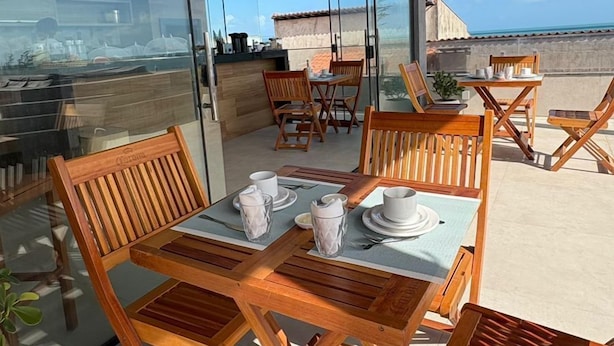 Breakfast area - Pousada Vista Encantada (Cruz)