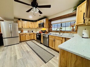 Fridge, microwave, oven, stovetop - Yough Lake Streamside Cottage w/ Hot Tub, Pavilion, Firepit (Confluence)