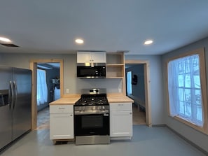 Fridge, microwave, oven, stovetop - Newly Renovated Sprawling 3 BR farmhouse in Jamaica on the river with 30 acres (Jamaica)