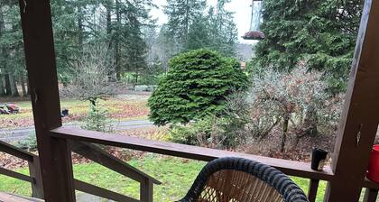 Charming Log Home on acreage bordering golf course