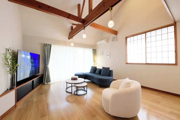 Basic Townhome, Balcony | Living room | Flat-screen TV, video-game console
