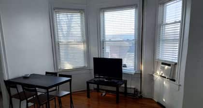 Cozy private bedroom with shared bathroom in charming Yonkers with AC