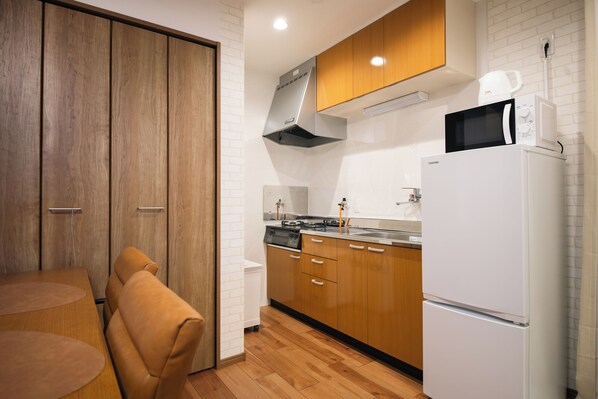 Apartamento, vista para a cidade | Cozinha privada