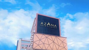 A multi-story building with a prominent sign reading "AZANA ASIA CILACAP". - Azana Asia Hotel Cilacap (Cilacap)