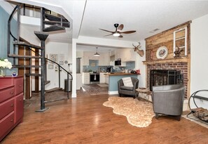 Smart TV, fireplace, books, music library