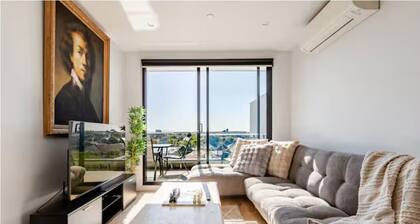 Stylish 2BR Apartment with Scenic Views - Walk to Shops, Dine & Train