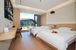 A hotel room with two beds, a desk with a chair, a large window, and a projector on the ceiling. - Su Pastoral RETIRE THE COUNTRYSIDE  (Shangrao)