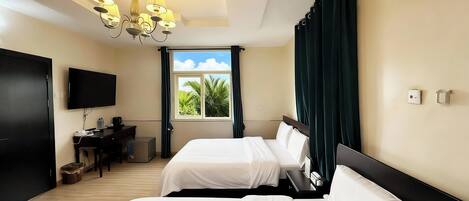 Business Twin Room, Garden View | Desk, laptop workspace, blackout drapes, soundproofing