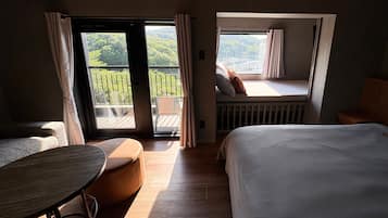 Quarto premium, varanda coberta, vista para o oceano | Wi-Fi de cortesia, roupa de cama