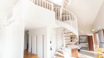 Panoramic Villa, Balcony, Lake View | Living area | 65-inch Smart TV with digital channels, DVD player