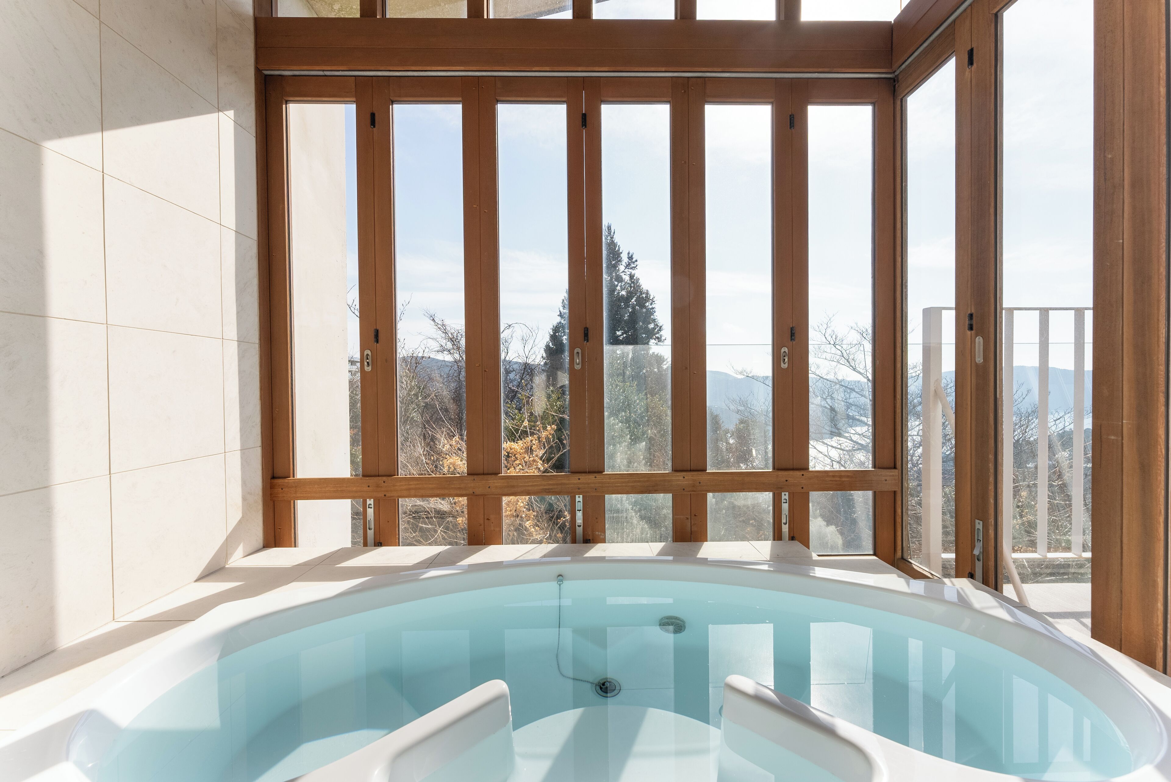 Panoramic Villa, Balcony, Lake View | Bathroom | Deep soaking tub, eco-friendly toiletries, hair dryer, slippers