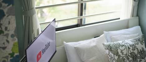 ベーシック ダブルまたはツインルーム 禁煙 シティビュー | 遮光カーテン、アイロン / アイロン台、WiFi (無料)、ベッドシーツ