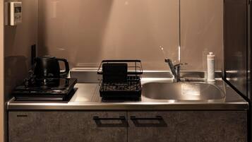 Fridge, microwave, stovetop, cookware/dishes/utensils