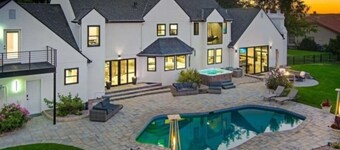 Luxurious 5-bedroom house in serene Eagle with sauna, pool, and fitness room.