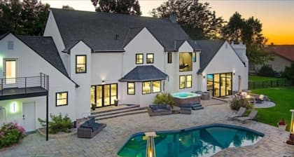 Luxurious 5-bedroom house in serene Eagle with sauna, pool, and fitness room.