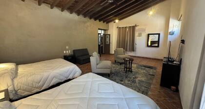 Galley downtown Tepoztlan with parking lot