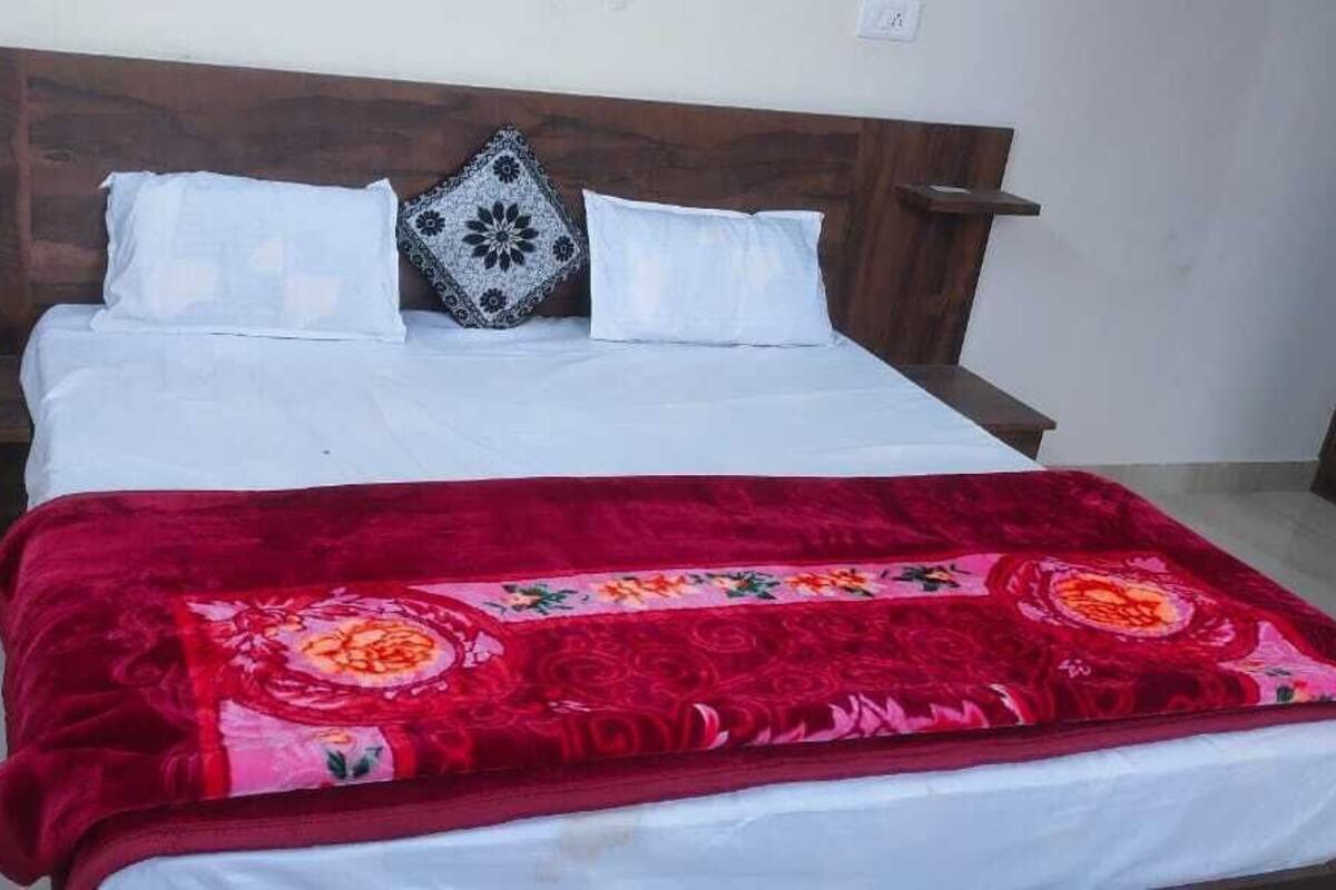 Habitación Deluxe | Camas extra, wifi gratis y ropa de cama