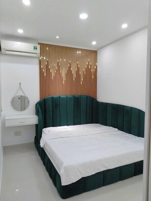 Desk, laptop workspace, iron/ironing board, free WiFi - Sky Garden 3 Apartment by Diamond Suite (Ho Chi Minh City)