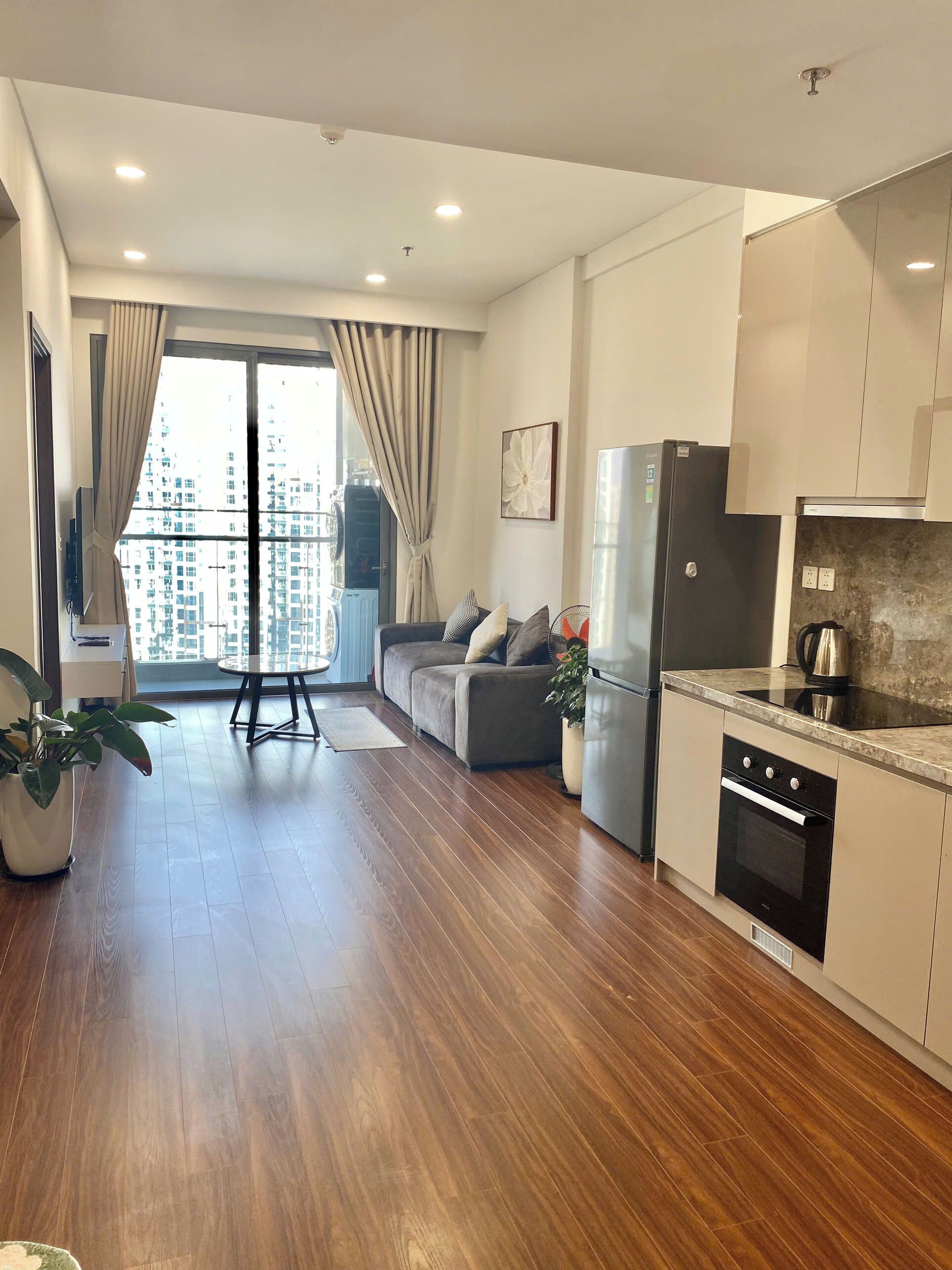 Departamento, balcón, vista a la ciudad | Área de sala de estar