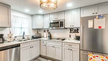 Fridge, microwave, dishwasher, coffee/tea maker